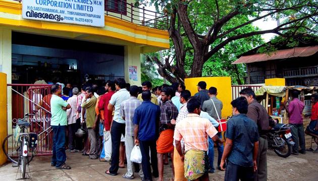 People queue up outside a liquor outlet before in Thiruvananthapuram, Kerala. (Vivek Nair/HT File Photo) People queue up outside a liquor outlet before in Thiruvananthapuram, Kerala. (Vivek Nair/HT File Photo)