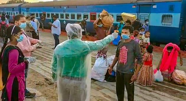 Migrants undergo thermal screening at Jagannathpur Railway Station in Odisha’s Ganjam district during the ongoing Covid-19 lockdown. (PTI File) Migrants undergo thermal screening at Jagannathpur Railway Station in Odisha’s Ganjam district during the ongoing Covid-19 lockdown. (PTI File)
