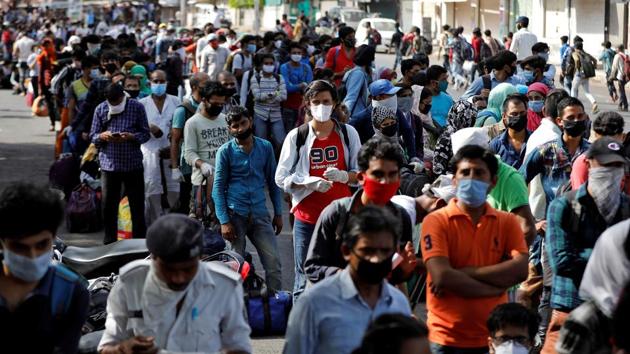 People wait in queues to enter a railway station to board a train to New Delhi after a limited reopening of India's rail network following a nearly seven-week lockdown to slow the spreading of the coronavirus disease (Covid-19), in Ahmedabad, India.(REUTERS) People wait in queues to enter a railway station to board a train to New Delhi after a limited reopening of India's rail network following a nearly seven-week lockdown to slow the spreading of the coronavirus disease (Covid-19), in Ahmedabad, India.(REUTERS)