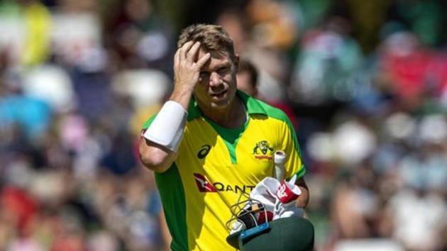 Australia's batsman David Warner leaves the field after being dismissed by South Africa's bowler Anrich Nortje.(AP)