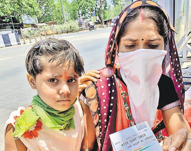 Babita Pal, a woman in her 20s who is speech impaired, along with her four-year-old daughter Vaishnavi, in the city on Wednesday.(HT/PHOTO)