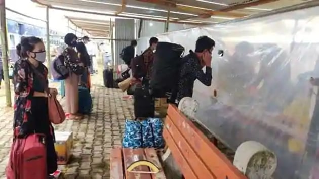 The first lot of stranded who arrived at manipur’s railhead Jiribam on Wednesday.(ANI) The first lot of stranded who arrived at manipur’s railhead Jiribam on Wednesday.(ANI)