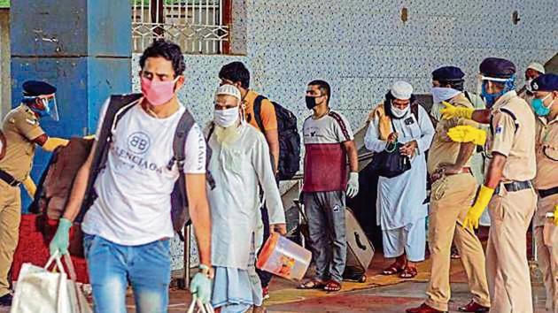 Passengers at a railway station in Bhubaneswar. (PTI) Passengers at a railway station in Bhubaneswar. (PTI)