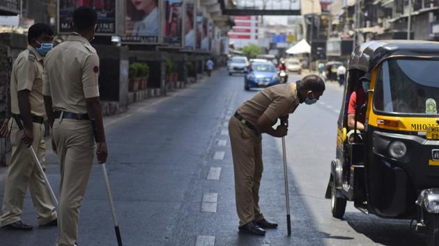 Mumbai police at a check post in Bandra on May 12. In a fresh move, Maharashtra on May 13 requested the Centre for greater central force deployment in the state to ease the pressure on its police force as it deals with the Covid-19 pandemic. 84 police officers and 709 constables have tested positive for Covid-19 so far. (Satish Bate / HT Photo) Mumbai police at a check post in Bandra on May 12. In a fresh move, Maharashtra on May 13 requested the Centre for greater central force deployment in the state to ease the pressure on its police force as it deals with the Covid-19 pandemic. 84 police officers and 709 constables have tested positive for Covid-19 so far. (Satish Bate / HT Photo)