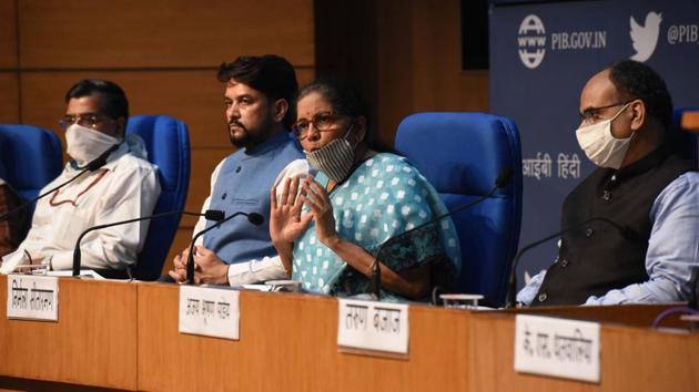 Union Minister of Finance and Corporate Affairs Nirmala Sitharaman with Minister of State for Finance and Corporate Affairs Anurag Thakur, Finance Secretary Ajay Bhushan Pandey and other officials during a press conference detailing the centre’s announcement of an economic stimulus package during lockdown, at the National Media Centre in New Delhi. (Sonu Mehta/HT PHOTO) Union Minister of Finance and Corporate Affairs Nirmala Sitharaman with Minister of State for Finance and Corporate Affairs Anurag Thakur, Finance Secretary Ajay Bhushan Pandey and other officials during a press conference detailing the centre’s announcement of an economic stimulus package during lockdown, at the National Media Centre in New Delhi. (Sonu Mehta/HT PHOTO)