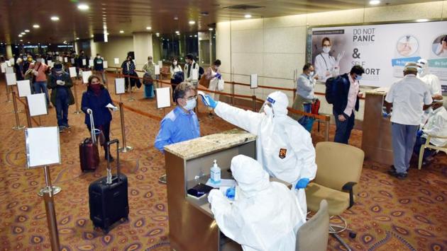 Passengers being thermal screened upon arrival to Mumbai via a special flight from London on May 10. (ANI) Passengers being thermal screened upon arrival to Mumbai via a special flight from London on May 10. (ANI)