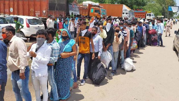 Migrants at Sherpur Chowk in Ludhiana registering themselves for the return to their native places on Friday. (GURPREET SINGH/HT) Migrants at Sherpur Chowk in Ludhiana registering themselves for the return to their native places on Friday. (GURPREET SINGH/HT)
