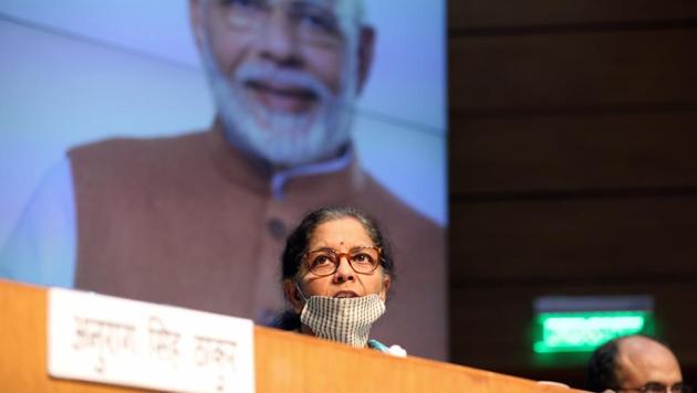 Nirmala Sitharaman, India's finance minister, wears a protective mask as she speaks during a news conference in New Delhi, India, on Wednesday, May 13, 2020.(Bloomberg)