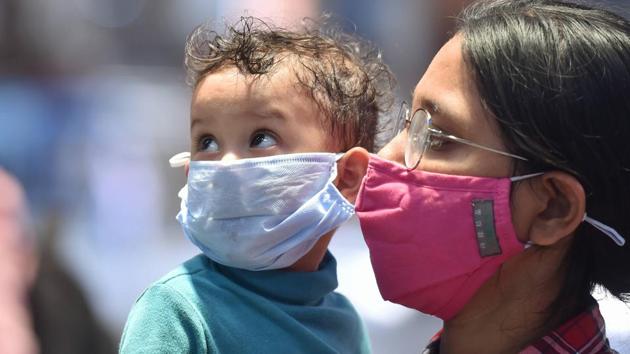 Kolkata: A woman with her child arrives at Howrah station via special train from New Delhi following the resumption of passenger train services by Indian Railways, during the ongoing COVID-19 nationwide lockdown, in Kolkata, Saturday, May 16, 2020. (PTI Photo/Swapan Mahapatra)(PTI) Kolkata: A woman with her child arrives at Howrah station via special train from New Delhi following the resumption of passenger train services by Indian Railways, during the ongoing COVID-19 nationwide lockdown, in Kolkata, Saturday, May 16, 2020. (PTI Photo/Swapan Mahapatra)(PTI)