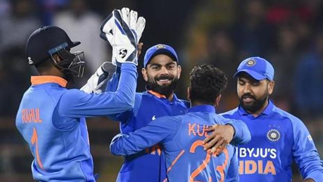 Rajkot: Indian bowler Kuldeep Yadav, Virat Kohli, Rohit Sharma and KL Rahul celebrates the wicket of Australian batsman Alex Carey during the second one day international (ODI) cricket match between India and Australia at Saurashtra Cricket Association Stadium in Rajkot, Friday, Jan. 17, 2020.(PTI) Rajkot: Indian bowler Kuldeep Yadav, Virat Kohli, Rohit Sharma and KL Rahul celebrates the wicket of Australian batsman Alex Carey during the second one day international (ODI) cricket match between India and Australia at Saurashtra Cricket Association Stadium in Rajkot, Friday, Jan. 17, 2020.(PTI)