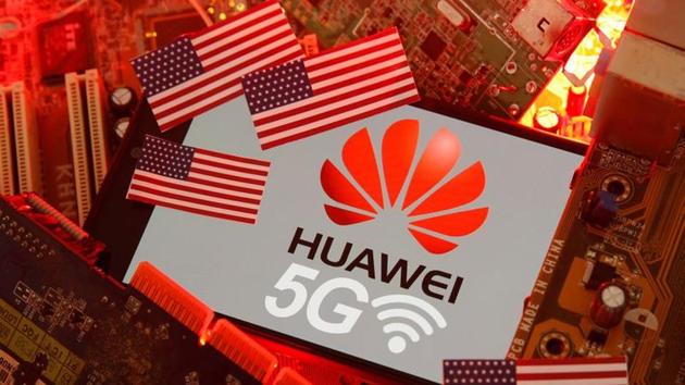 The U.S. flag and a smartphone with the Huawei and 5G network logo are seen on a PC motherboard in this illustration taken January 29, 2020.(REUTERS File)