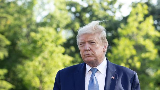 US President Donald Trump listens to members of the media on the South Lawn of the White House in Washington DC, U.S.(Bloomberg) US President Donald Trump listens to members of the media on the South Lawn of the White House in Washington DC, U.S.(Bloomberg)