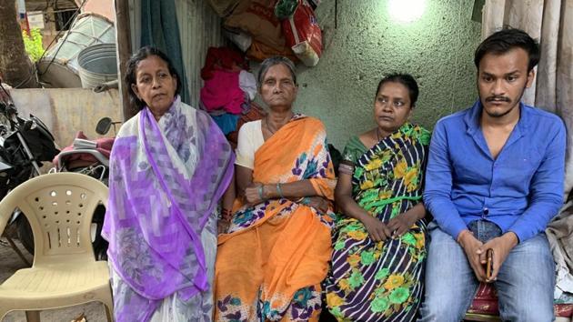 (L-R) Two sisters, wife and son of Yeshudas Moti Francis sitting next to the empty chair in which the deceased often sat. (Shalaka Shinde/HT Photo) (L-R) Two sisters, wife and son of Yeshudas Moti Francis sitting next to the empty chair in which the deceased often sat. (Shalaka Shinde/HT Photo)