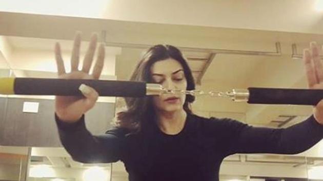 Sushmita practices with nunchaku.