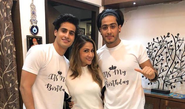 Urvashi Dholakia with her sons, Sagar and Kshitij.