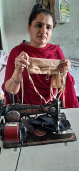 Sakshi Taak, an ex-ITI student making masks. (HT PHOTO) Sakshi Taak, an ex-ITI student making masks. (HT PHOTO)