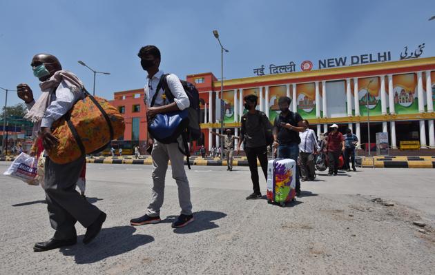 People who arrived at New Delhi Railway Station (NDLS) by a special train search for transport options to take them onward, in New Delhi. (Raj K Raj/ Hindustan Times) People who arrived at New Delhi Railway Station (NDLS) by a special train search for transport options to take them onward, in New Delhi. (Raj K Raj/ Hindustan Times)