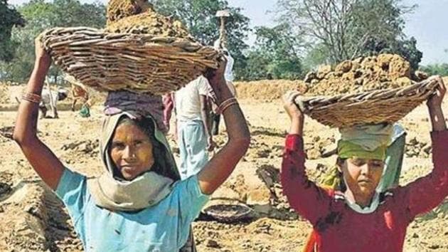 The earlier budget estimate for the Mahatma Gandhi National Rural Employment Guarantee Act (MGNREGA) was Rs 61,000 crore.(HT file photo. Representative image)