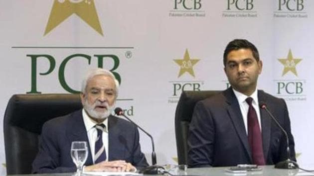 Pakistan Cricket Board's new managing director Wasim Khan, right, looks on during a press conference with the PCB chairman Ehsan Mani.(AP)