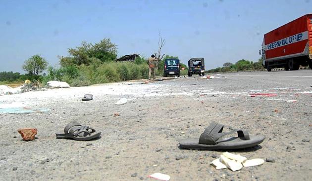 Slippers lying on the road where an accident took place claiming 26 lives of migrant workers near Auraiya district during the lockdown, in Lucknow on May 16.(ANI)