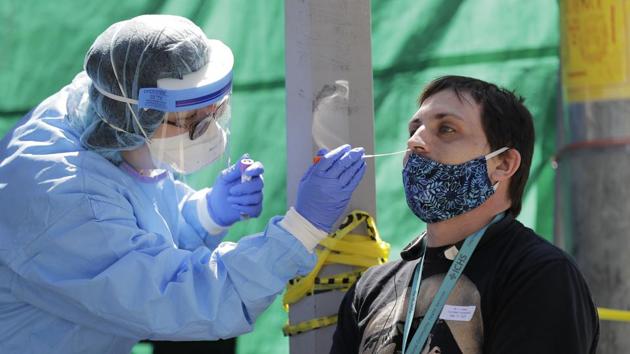 The government has drawn out a containment plan as clusters posing high risk of further spread of Covid-19 have emerged. (AP) The government has drawn out a containment plan as clusters posing high risk of further spread of Covid-19 have emerged. (AP)