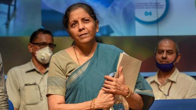 Union Finance Minister Nirmala Sitharaman leaves after announcing the fifth and final tranche of economic stimulus package during a press conference, at the National Media Centre in New Delhi.(PTI Photo)