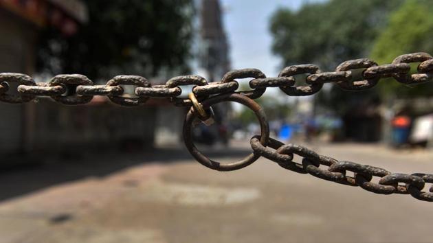 A view of Lajpat Nagar Market wearing a deserted look during ongoing Covid-19 lockdown in New Delhi. (PTI) A view of Lajpat Nagar Market wearing a deserted look during ongoing Covid-19 lockdown in New Delhi. (PTI)
