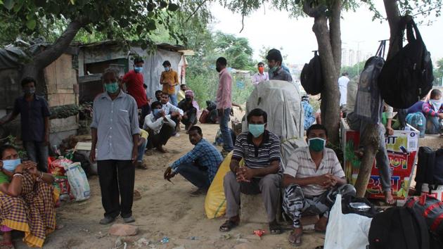 Stranded migrant workers gathered in Islampur village after they were stopped by Gurugram Police while heading back home to another state, near Tau Devi Lal Stadium, in Gurugram.(Yogendra Kumar/HT PHOTO) Stranded migrant workers gathered in Islampur village after they were stopped by Gurugram Police while heading back home to another state, near Tau Devi Lal Stadium, in Gurugram.(Yogendra Kumar/HT PHOTO)
