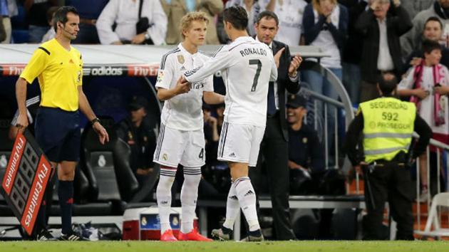 Cristiano Ronaldo embraces 16-year-old Martin Odegaard from Norway.(AP Photo)