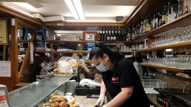 A cafe reopens as Italy eases some of the lockdown measures put in place during the coronavirus disease (COVID-19) outbreak, in Venice, Italy.(REUTERS)