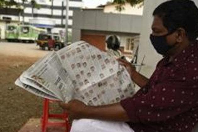 A man reads a newspaper at a bus terminus in Kochi, Kerala. Newspapers readers are highly likely to jump to a page or section of their preference. This guarantees a significant number of eyeballs in direct correlation to the popularity of a certain section or page.(AP Photo) A man reads a newspaper at a bus terminus in Kochi, Kerala. Newspapers readers are highly likely to jump to a page or section of their preference. This guarantees a significant number of eyeballs in direct correlation to the popularity of a certain section or page.(AP Photo)