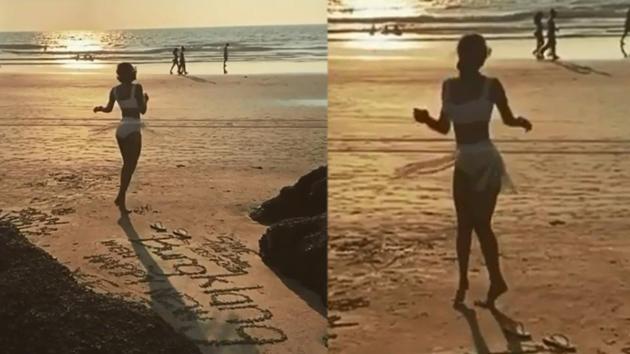 Malaika Arora spins on the beach in throwback video.