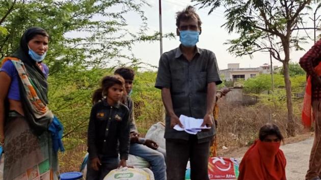 A migrant worker Brij Kishore Ahirwar, along with his family members, after arriving in Jhansi on a truck from Haryana’s Bahadurgarh town. A migrant worker Brij Kishore Ahirwar, along with his family members, after arriving in Jhansi on a truck from Haryana’s Bahadurgarh town.