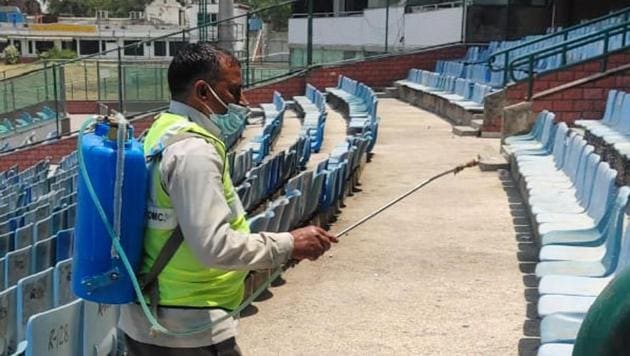 Disinfectant being sprayed in stands.(HT photo)