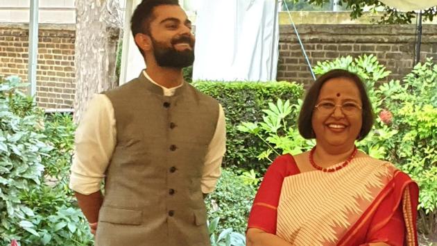 India captain Virat Kohli with Ruchi Ghanashyam at a reception for the cricket team in the high commissioner’s residence in Kensington Palace Gardens on June 7, 2019. (HT photo) India captain Virat Kohli with Ruchi Ghanashyam at a reception for the cricket team in the high commissioner’s residence in Kensington Palace Gardens on June 7, 2019. (HT photo)