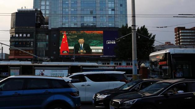 A giant screen displays news footage of Chinese President Xi Jinping speaking via video link to the World Health Assembly (WHO), following the coronavirus disease (COVID-19) outbreak, in Beijing. (REUTERS) A giant screen displays news footage of Chinese President Xi Jinping speaking via video link to the World Health Assembly (WHO), following the coronavirus disease (COVID-19) outbreak, in Beijing. (REUTERS)