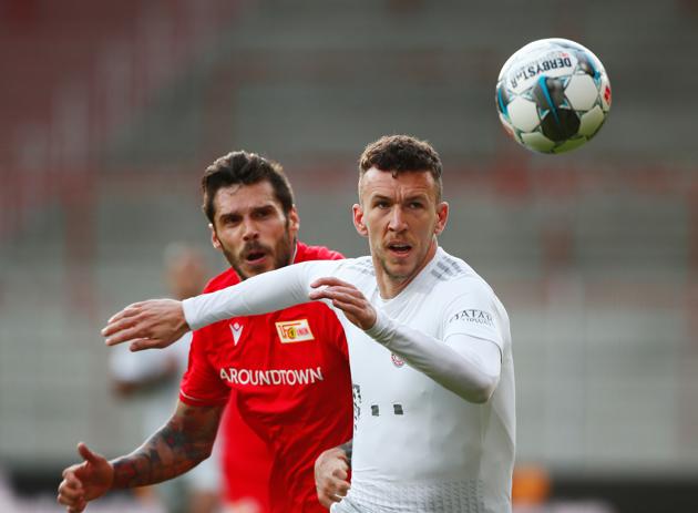 Bayern Munich's Ivan Perisic in action with FC Union Berlin's Christopher Trimmel. (REUTERS)