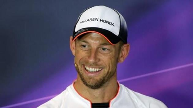 Jenson Button of Britain smiles during the news conference. (REUTERS) Jenson Button of Britain smiles during the news conference. (REUTERS)