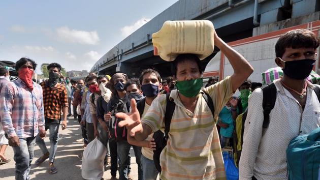 Migrant workers gathered at Sion station to board a special train to Uttar Pradesh during lockdown in wake of Covid-19 pandemic in Mumbai, India, on Tuesday, May 19, 2020. (Satish Bate/HT Photo) Migrant workers gathered at Sion station to board a special train to Uttar Pradesh during lockdown in wake of Covid-19 pandemic in Mumbai, India, on Tuesday, May 19, 2020. (Satish Bate/HT Photo)