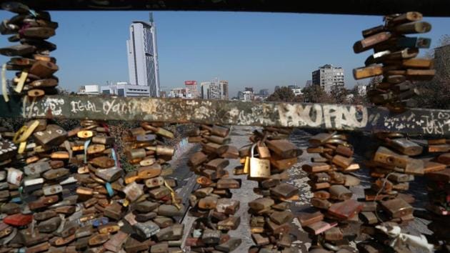 ‘Love locks’ are seen on a bridge, with downtown Santiago in the background. Chile surpassed 40,000 cases of the new coronavirus last week amid a sharp spike in infections that has seen hospitals approach collapse in the weeks ahead of the Southern Hemisphere winter. (Ivan Alvarado / REUTERS)