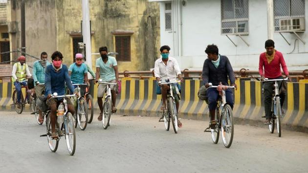 Migrants travelling on bicycles trying to reach their homes, in Patna, Bihar, on Monday.(Santosh Kumar/HT Photo)