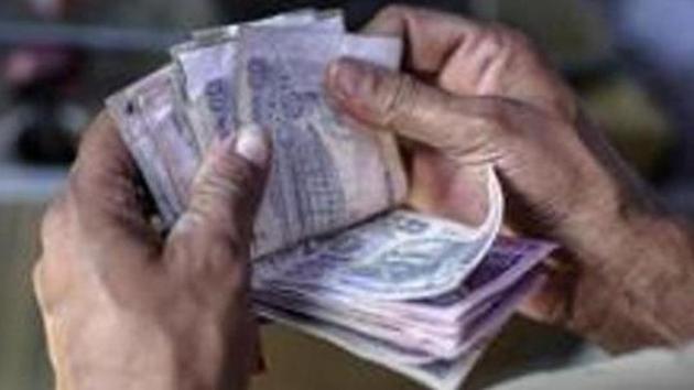 On Monday, the rupee had settled at 75.91 against the US dollar. (Bloomberg) On Monday, the rupee had settled at 75.91 against the US dollar. (Bloomberg)