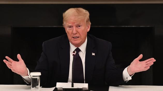 US President Donald Trump speaks during a meeting with restaurant executives in the State Dining Room of the White House May 18, 2020, in Washington, DC. (AFP) US President Donald Trump speaks during a meeting with restaurant executives in the State Dining Room of the White House May 18, 2020, in Washington, DC. (AFP)