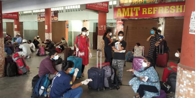 Passengers waiting for medical screening at the inter-state bus terminal in Ludhiana on Tuesday. (HT Photo) Passengers waiting for medical screening at the inter-state bus terminal in Ludhiana on Tuesday. (HT Photo)