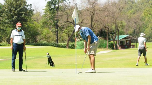 Golfers during practice at the Chandigarh Golf Club which has opened after 60 days owing to the lockdown in wake of the Covid epidemic, on Wednesday.(Keshav Singh/HT) Golfers during practice at the Chandigarh Golf Club which has opened after 60 days owing to the lockdown in wake of the Covid epidemic, on Wednesday.(Keshav Singh/HT)
