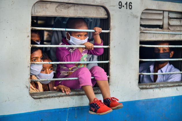 Migrants onboard a train leave for their native places in Bihar, during ongoing nationwide Covid-19 lockdown (PTI Photo) Migrants onboard a train leave for their native places in Bihar, during ongoing nationwide Covid-19 lockdown (PTI Photo)