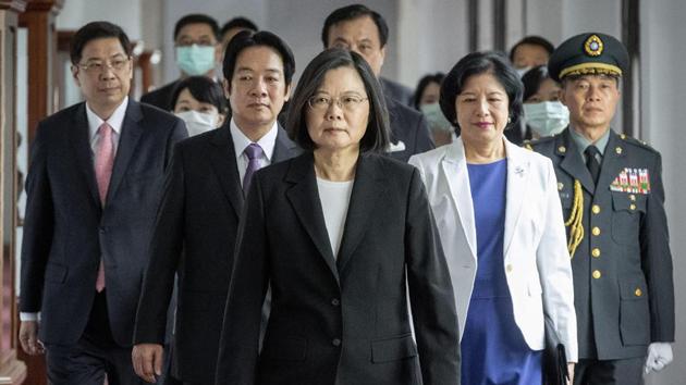 In this photo released by the Taiwan Presidential Office, Taiwanese President Tsai Ing-wen, center, walks ahead of Vice-President Lai Ching-te, left of her, as they attend an inauguration ceremony in Taipei, Taiwan.(PTI Photo)
