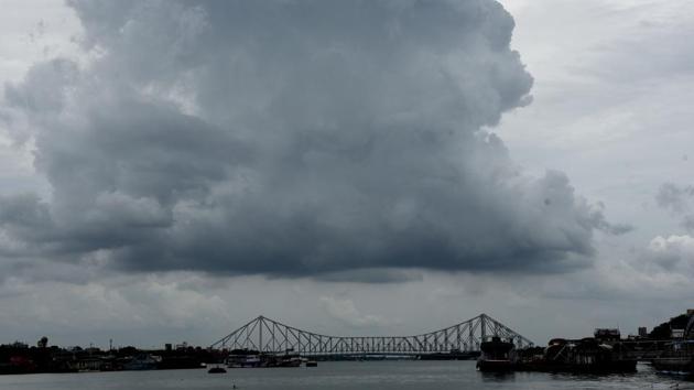 Dark clouds loom over the Hooghly river in Kolkata, which is one of the cities that will be affected by the movement of the cyclone. The other districts in West Bengal which will bear the brunt of the cyclone are Hooghly, North and South 24 Parganas. (Samir Jana / HT Photo) Dark clouds loom over the Hooghly river in Kolkata, which is one of the cities that will be affected by the movement of the cyclone. The other districts in West Bengal which will bear the brunt of the cyclone are Hooghly, North and South 24 Parganas. (Samir Jana / HT Photo)