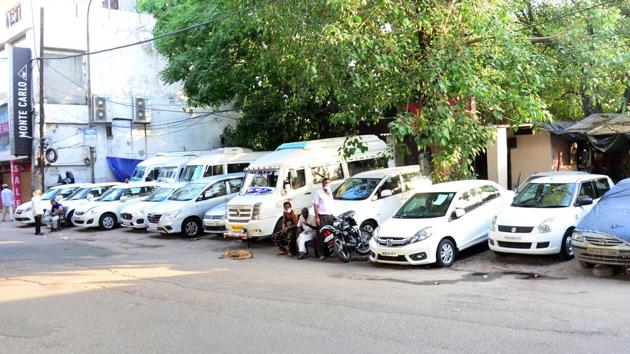 Taxis parked outside the Ludhiana railway station on Wednesday.(Gurpreet Singh/HT)
