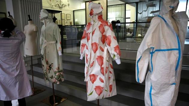 Protective suits with printed patterns designed by Zhou Li are seen displayed at a studio in Beijing, following the novel coronavirus disease (COVID-19) outbreak, China May 17, 2020. Picture taken May 17, 2020. REUTERS/Tingshu Wang (REUTERS) Protective suits with printed patterns designed by Zhou Li are seen displayed at a studio in Beijing, following the novel coronavirus disease (COVID-19) outbreak, China May 17, 2020. Picture taken May 17, 2020. REUTERS/Tingshu Wang (REUTERS)